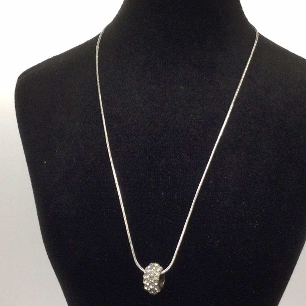 Woman’s Necklace Rhinestone Piece on a 16” Sliver chain.